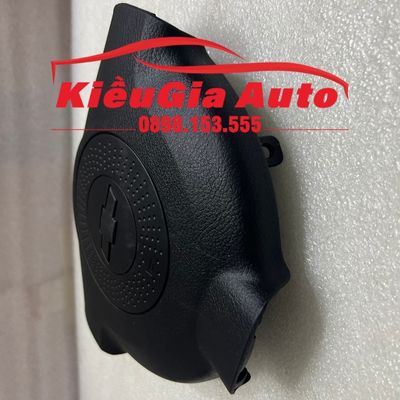 Nắp đậy vô lăng Chevrolet Aveo 2009-2012 Nắp đậy vô lăng Chevrolet Aveo 2009-2012
